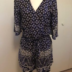 Blue, floral romper by Lovers & Friends. EUC!